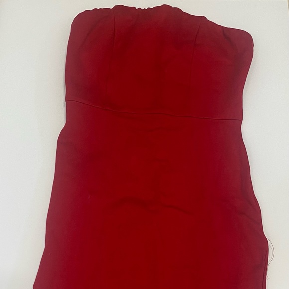 Red strapless mini dress with zipper and slit. Never worn. Size small. - Picture 1 of 6